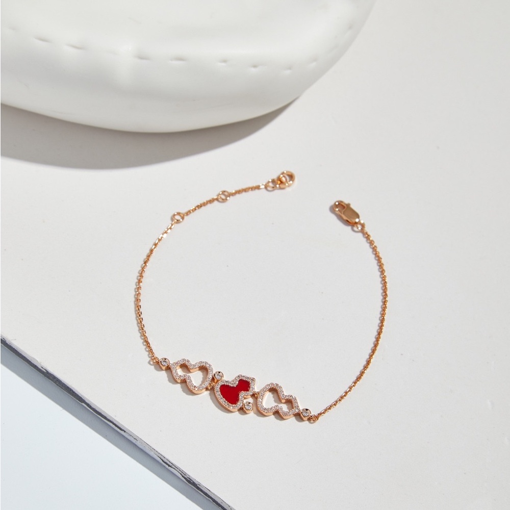 Elegant Red Heart Bracelet with Gold Accents